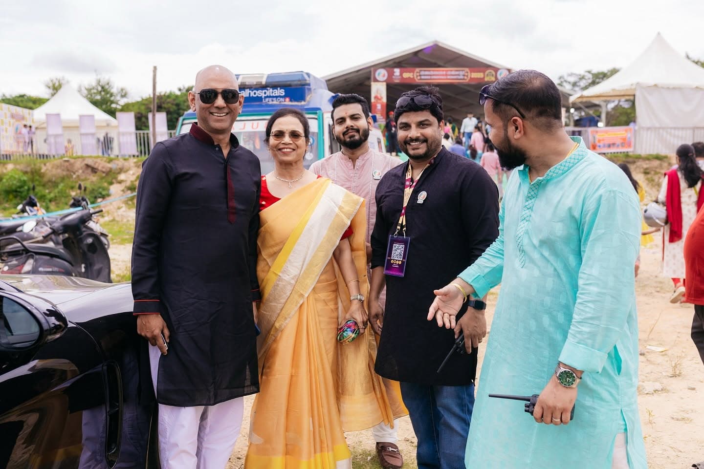 Guest performing puja rituals at the event